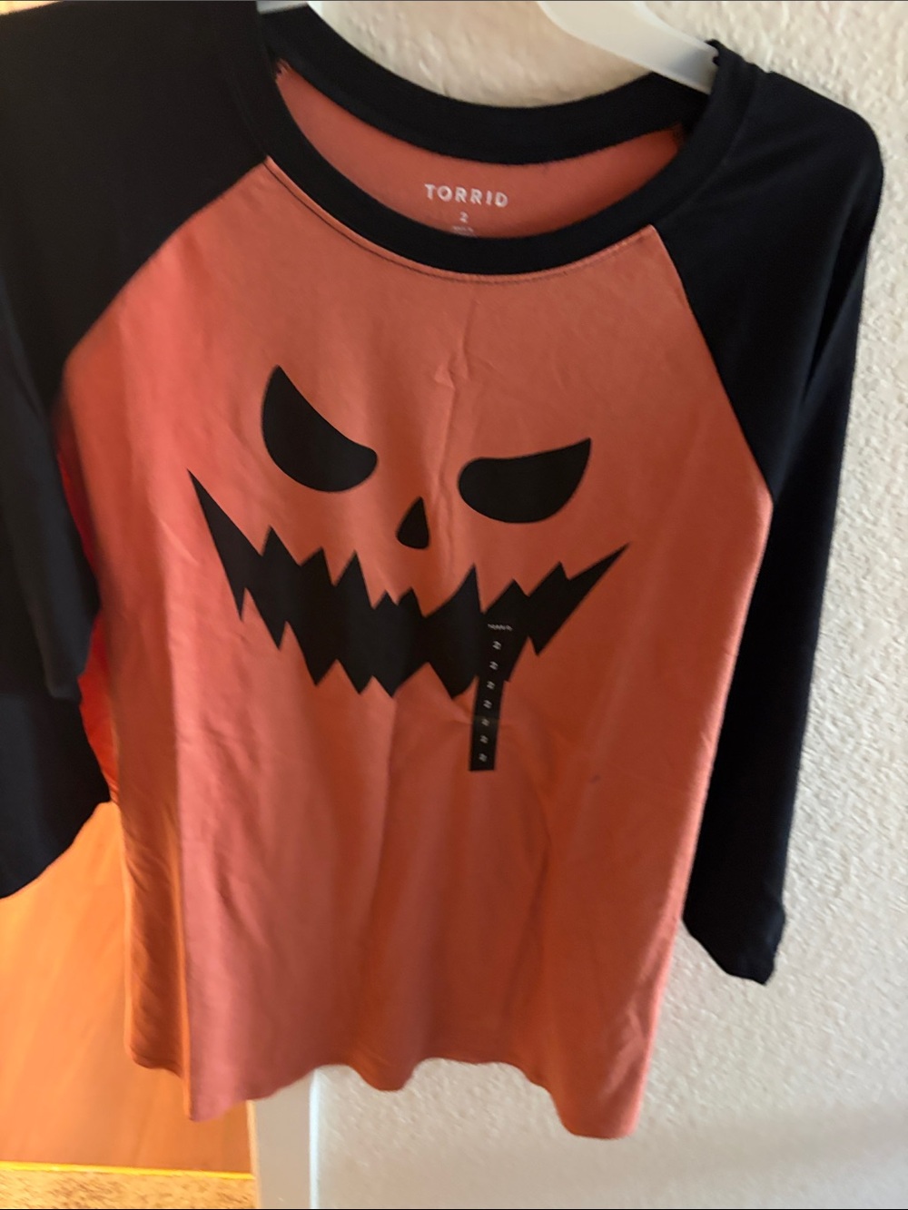 Torrid Orange and Black Pumpkin Face Raglan Top - Picture 2 of 6